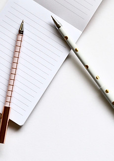 Two Pens on Notebook